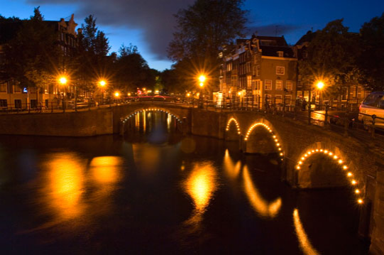 Lights along canal bridges along Herengracht near the famous &#39;Golden Bend&#39;.