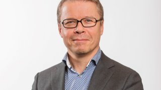 Docent/Eventmanager deelt praktijkervaring tijdens de les