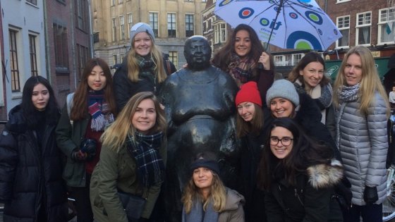 Exchange students make a walk through Utrecht on a rainy day
